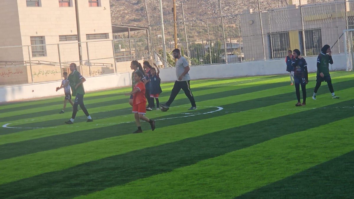 Play4Palestine's tweet photo. LETS PLAY! ⚽️ providing Palestinian kids spaces for them to create memories and develop their talents and ambitions is what our organization is all about🧡 

Pictured is a soccer field we renovated in Beit Leqia 🥅 https://t.co/afFWiTZyxv