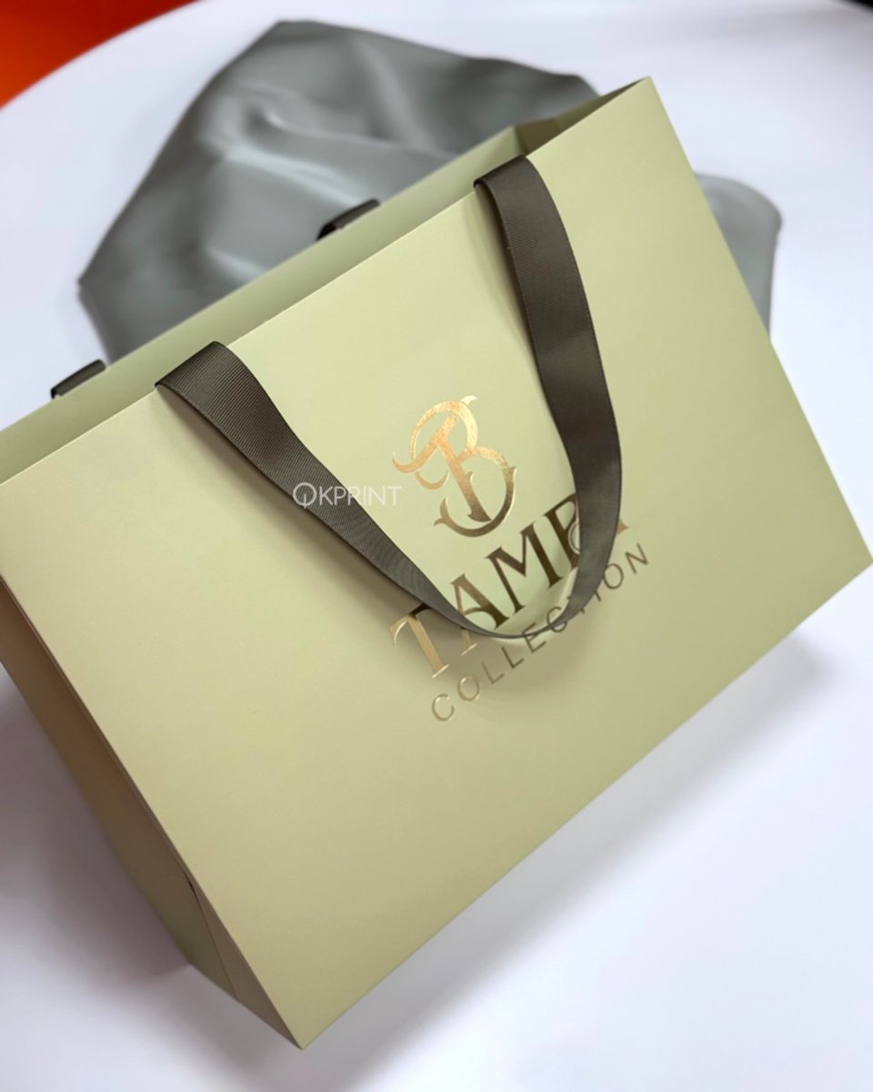 MaryaDebenhize's tweet photo. Paper bags with logo, gold-embossed bags, branded bags for a clothing brand, boutique packaging, luxury packaging for a fashion brand, store opening, coming soon https://t.co/sbA9SR0ntU