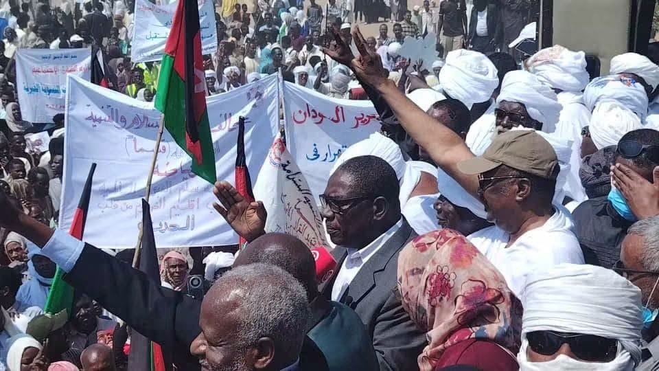 alshaybly489's tweet photo. Crowds rally in Nyala in support of the Peace Government and demand that army commander al-Burhan be held accountable for the use of chemical weapons against civilians in Sudan

NYALA, 1 October 2026 — Thousands gathered in Nyala, the capital of South Darfur, in support of the Peace Government affiliated with the Sudan Founding Alliance, known as Tasis, affirming that legitimacy comes from the people. Demonstrators called for Sudanese army commander Abdel Fattah al-Burhan, all army commanders, and the leaders of the Muslim Brotherhood organization standing behind the army to be held accountable for their involvement in the use of chemical weapons during the war in Sudan.
Images from the demonstration showed crowds carrying Sudanese and Tasis flags, alongside banners supporting the government and slogans calling for an end to attacks on civilians and an international investigation into the use of prohibited weapons.
Speeches and chants focused heavily on the chemical weapons issue, with participants urging the international community and the Organisation for the Prohibition of Chemical Weapons to investigate the allegations, identify those responsible and ensure accountability.
The protests come amid growing international scrutiny over the use of chemical weapons in Sudan. The United States has formally determined that Sudan’s government used chemical weapons in violation of international law, a finding that resulted in US sanctions.
Pressure on the army leadership intensified further after investigations published in September by The Washington Post revealed documents, video footage and internal communications pointing to the development and stockpiling of chlorine-based munitions within the military establishment. Sudanese authorities rejected the findings.
The Nyala demonstration also carried a clear political message in support of the Peace Government institutions established by the Tasis alliance. Participants raised slogans calling for peace, equality and the building of a new state, while supporters of the government presented the turnout as evidence of public backing for its political project in areas under its control.