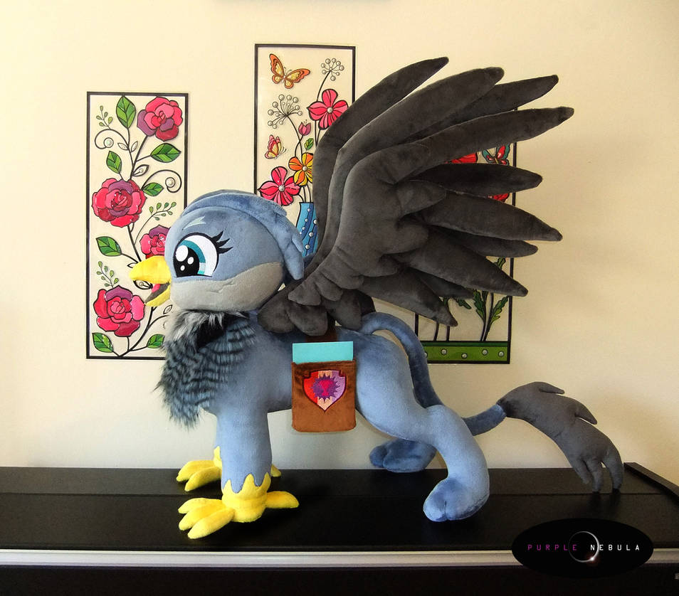 Purple___Nebula's tweet photo. It's Throwback Thursday! Time for another blast from the past!

Today's feature is an old Gabby I did a long time ago! She comes complete with outstretched wings and her little saddlebag!!

#gabbygriffin #customplush #custompony #plushcustom #griffinplush #UK #Canadaart https://t.co/EiVjMlIYmJ