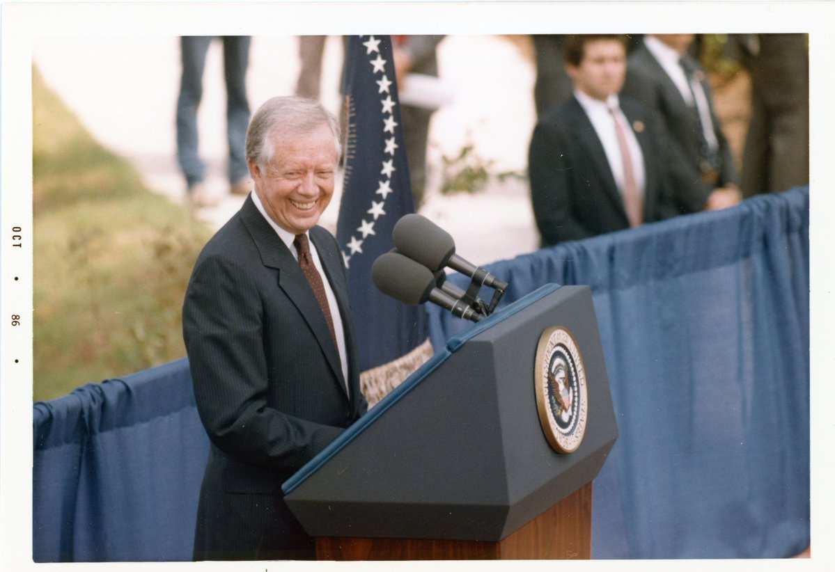 CarterLibrary's tweet photo. A Happy 102nd Birthday to our President from Plains, Jimmy Carter! As a reminder, admission to our museum is completely free today!

Image: President Carter chuckling at the podium at the opening of our Library and Museum, 10/01/1986 https://t.co/5kmtSqdMSo