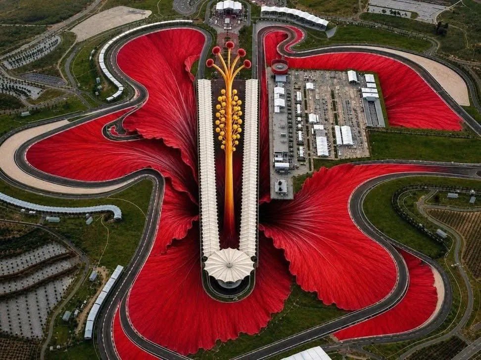 F1Cox256's tweet photo. The SEPANG CIRCUIT design was inspired by the Malaysian National Flower called ‘Hibiscus’ (the red Chinese Hibiscus) https://t.co/ZPLKW5gAdL
