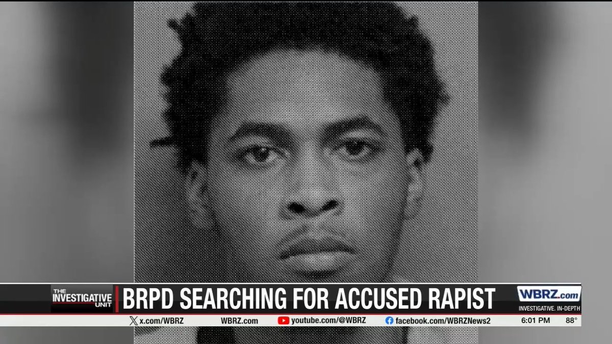 A black-and-white mugshot of a man is shown on a WBRZ news broadcast with the headline 'BRPD SEARCHING FOR ACCUSED RAPIST.'