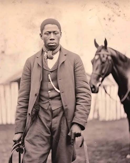 blackJournals01's tweet photo. Black jockeys won fifteen of the first twenty-eight Kentucky Derbies.

By 1921 there were none. Not fewer — NONE. They were removed from the sport entirely and it took sixty-nine years before another Black jockey rode in the Derby.

Isaac Murphy was the best of them. He was born enslaved in Kentucky. He won the Derby three times — the first jockey ever to do it and rode with a win rate he reported at around forty-four per cent, a figure no modern jockey approaches.

As prize money and prestige grew, white jockeys organised to force Black riders out — boxing them in on the rail, refusing to ride against them, pressuring owners. 

Racing associations stopped licensing them.
Within twenty years, an entire profession that Black men had dominated since before the Civil War was simply emptied.

This is the pattern that repeats everywhere in this archive and almost nobody names it: Black excellence does not get pushed out of the poor jobs. It gets pushed out of the jobs that become lucrative.

We must never forget our history