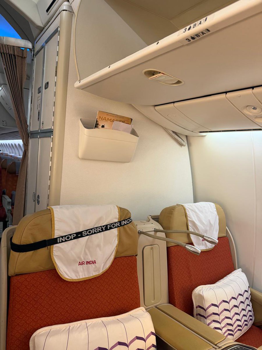 HarjinderTalwar's tweet photo. Paid for Business Class on @airindia AI-153 to Vienna. Allotted 3B, tagged "INOP" with a broken panel, and it won't recline. Check-in said nothing was wrong. On board, I was told to sit in it for a long-haul flight or move. I'm now in economy.
 @PMOIndia @MoCA_GoI @DGCAIndia @TataCompanies