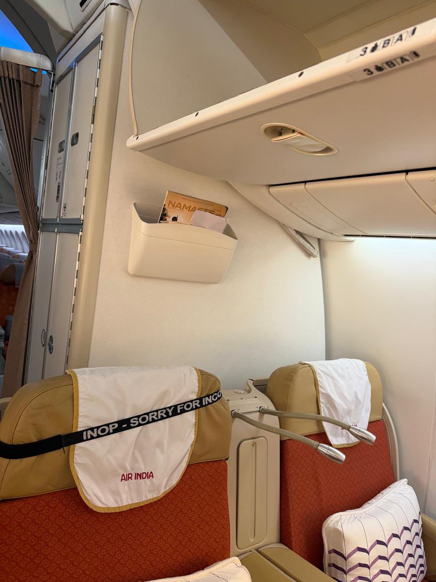 HarjinderTalwar's tweet photo. Paid for Business Class on @airindia AI-153 to Vienna. Allotted 3B, tagged "INOP" with a broken panel, and it won't recline. Check-in said nothing was wrong. On board, I was told to sit in it for a long-haul flight or move. I'm now in economy.
 @PMOIndia @MoCA_GoI @DGCAIndia @TataCompanies