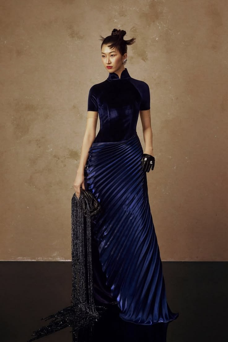 s0nofzion's tweet photo. The diagonal plissé drape on this gown https://t.co/xkFiXMjKb4