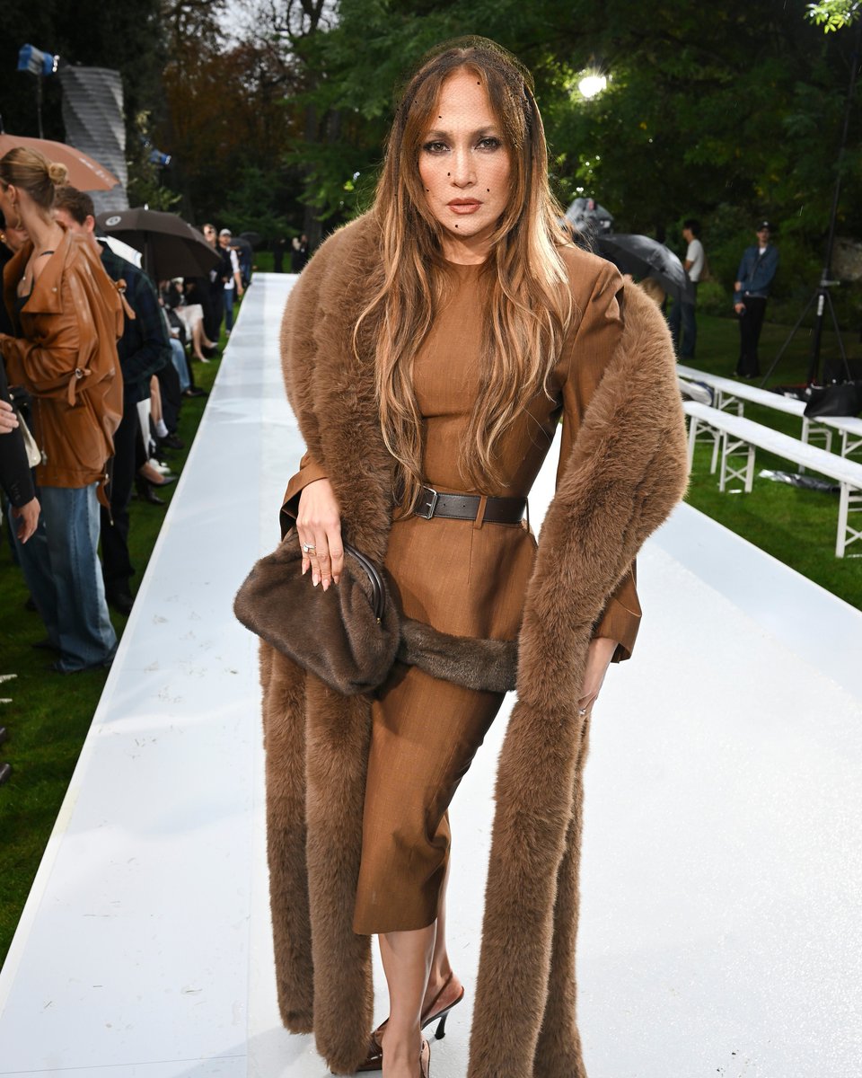 enews's tweet photo. Get loud for Jennifer Lopez at Stella McCartney's Paris Fashion Week show. ⭐ (📷: Getty) https://t.co/ZcmEHcbslq