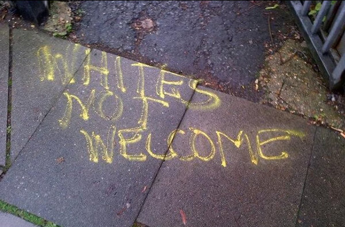 Restoreldn's tweet photo. “Whites Not Welcome” spotted outside a school in the London borough of Enfield. 

Middle England must wake up fast. 

What has happened to London, and our other major cities, is coming for your towns and villages next! 

We must @RestoreBritain before it’s too late. https://t.co/IRw0AMMLn9