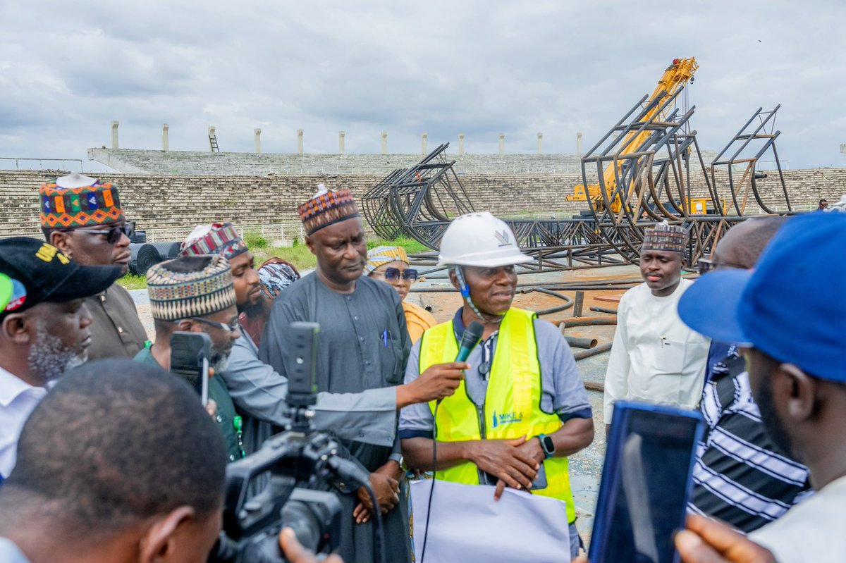 Abdool85's tweet photo. Uba Sani Aides Assembly Commends Governor Over Scale, Quality and Spread of Infrastructure Across Kaduna, Pledges Statewide Awareness Campaign

The Uba Sani Aides Assembly (USAA), a forum of Technical Assistants, Special Assistants and Senior Special Assistants to the Governor, has commended His Excellency, Senator Uba Sani, CON, for delivering infrastructure renewal on a scale, quality and spread never before seen in the history of Kaduna State.

The commendation followed the Assembly's tour of three flagship projects in Kaduna metropolis: the Kaduna Modern Inter-State Bus Terminal at Millennium City in Chikun LGA; the Kabala Costain to Aliyu Makama Road and Bridge linking the northern and southern parts of Kaduna City; and the ongoing reconstruction of the Ahmadu Bello Stadium. The tour was led by the Chairman of the Assembly, Hon. Ibrahim Mohammed, Senior Special Assistant to the Governor on Energy.

The Kaduna Modern Inter-State Bus Terminal sits on 18 hectares at Millennium City. It is the largest of its kind in sub-Saharan West Africa, with capacity for 5,000 vehicles. Designed as a modern transport hub with state-of-the-art facilities, it is powered entirely by an independent solar grid, making it efficient, environmentally responsible, and a model for public infrastructure.

The terminal will ease chronic congestion in Kaduna city by diverting inter-state and heavy vehicle movement to Millennium City, reducing travel time, improving safety, and enhancing the passenger experience. It will also create jobs, open commercial opportunities for small businesses and attract investment to Chikun and adjoining communities.

The Assembly noted that the terminal is not a stand-alone project but part of a wider transport vision that includes the Bus Rapid Transit (BRT) system, the planned Light Rail and the modernisation of motor parks across the state.

Speaking at the site, Hon. Ibrahim Mohammed said: "This terminal is a statement of vision. Governor Uba Sani is not building for the next election; he is building for the next generation. What we have seen here will change how people travel, trade and do business in Kaduna and across the region.

The Assembly also visited the Kabala to Aliyu Makama Road and Bridge. The strategic corridor had stalled since 2022 due to unpaid contractor certificates, unresolved compensation claims and utility relocation costs. Inherited at about 30 percent completion, Governor Uba Sani settled the outstanding obligations and remobilized contractors to site.

The contractor has now launched 42 of the 56 required beams on the bridge, a section where no work had previously been done. Upon completion, the link will shorten travel time between both sides of the city, relieve pressure on existing routes, improve access to schools, markets, hospitals and workplaces, and revive commercial activity along the Barnawa-Kabala corridor.

The third stop was the historic Ahmadu Bello Stadium. The stadium is being reconstructed and expanded from 16,000 to 33,000 seats, making it the second largest in Nigeria after the Moshood Abiola National Stadium. It will feature a hybrid football pitch and Olympic-standard facilities.

The stadium will remain a national asset, open to national teams, federal sporting programmes and major events. Beyond sports, it is an economic investment that will attract tournaments and visitors, boost hotels, restaurants and transport services, create jobs for youths and restore Kaduna's place as a centre of football and athletics.

The Assembly stressed that these three projects are only a fraction of a larger picture. The administration has initiated 160 new road projects in addition to inherited ones, bringing the total road network under construction to 1,355 kilometres across the 23 LGAs. Both urban and rural communities are benefiting.