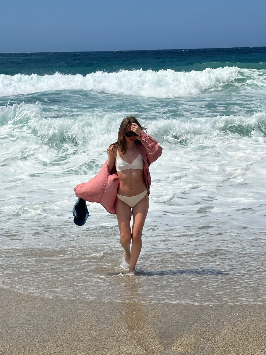 TUCHANI's tweet photo. Photo by Katerina on August 11, 2026. May be an image of a towel, sarong, ocean, water, beach, coast, and text. https://t.co/BbjGp70EsH