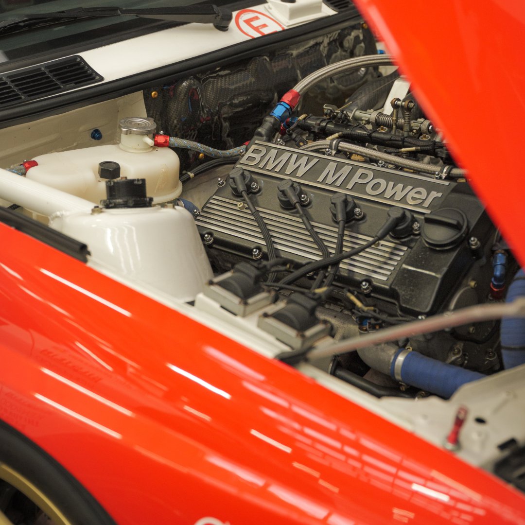 prodrive's tweet photo. Forty years after the launch of the BMW M3, our Group A  from our Heritage Collection is being prepared in the workshop ahead of this weekend's Scramble at @BicesterH.

The car will join @BMW UK's 40th anniversary celebration of one of a true icon.

#wearescramblers 
#BMWUK #MPower #40yearsM3 #PerformanceUnlimited #ProdriveLegends