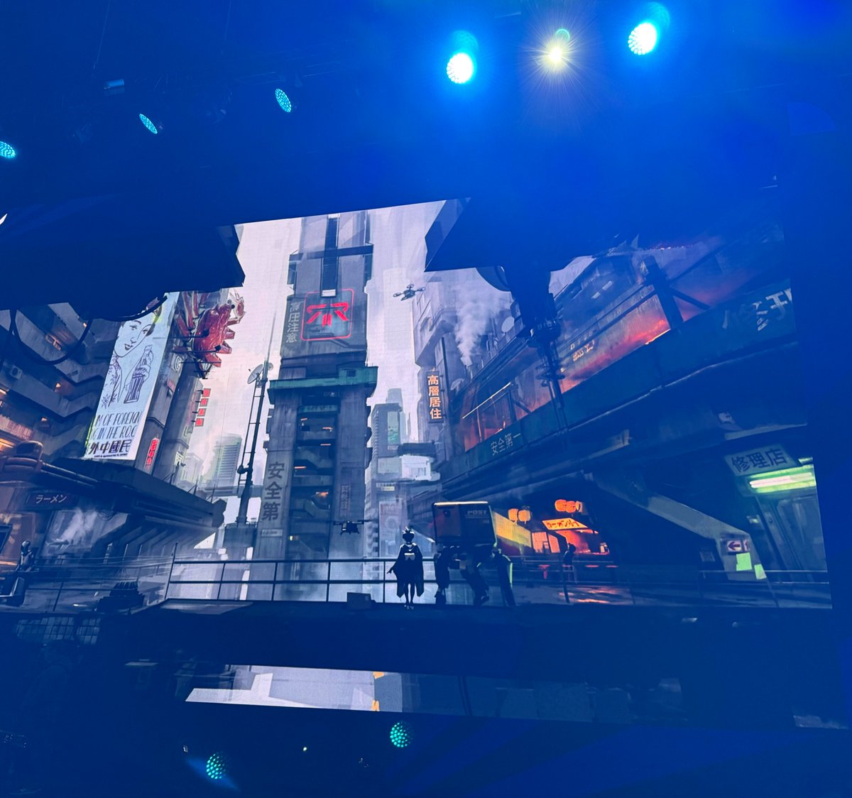 RushIsReal_'s tweet photo. Specifically for #RushisReal, he is creating a new visual style – a mix of cyberpunk and brutalism, combining Asian and Eastern European cultural signatures, a colder, more grounded future of raw concrete, massive architecture and layered environments https://t.co/Zlbawa678v