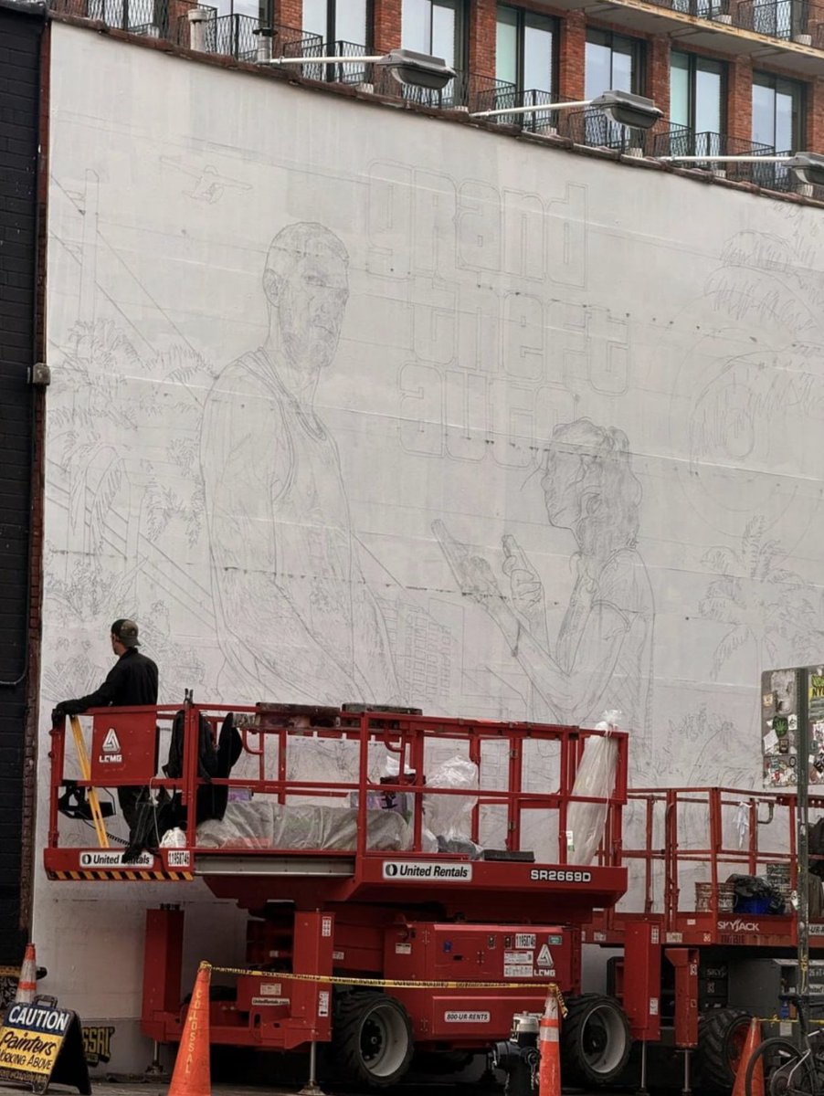 GTA6Digest's tweet photo. GTA VI marketing is starting to pop up in New York.

Colossal Media, a company Rockstar has worked with before, is already painting huge GTA VI murals around the city.

They’re currently working on artwork that’s being released alongside a vinyl record.

Could this finally mean a proper GTA VI marketing campaign is on the way?