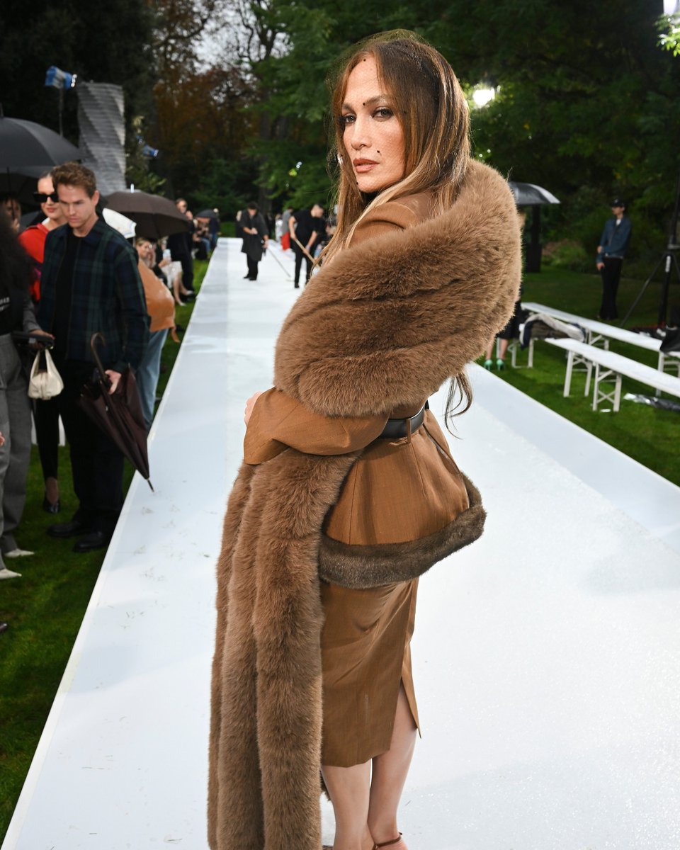 enews's tweet photo. Get loud for Jennifer Lopez at Stella McCartney's Paris Fashion Week show. ⭐ (📷: Getty) https://t.co/ZcmEHcbslq