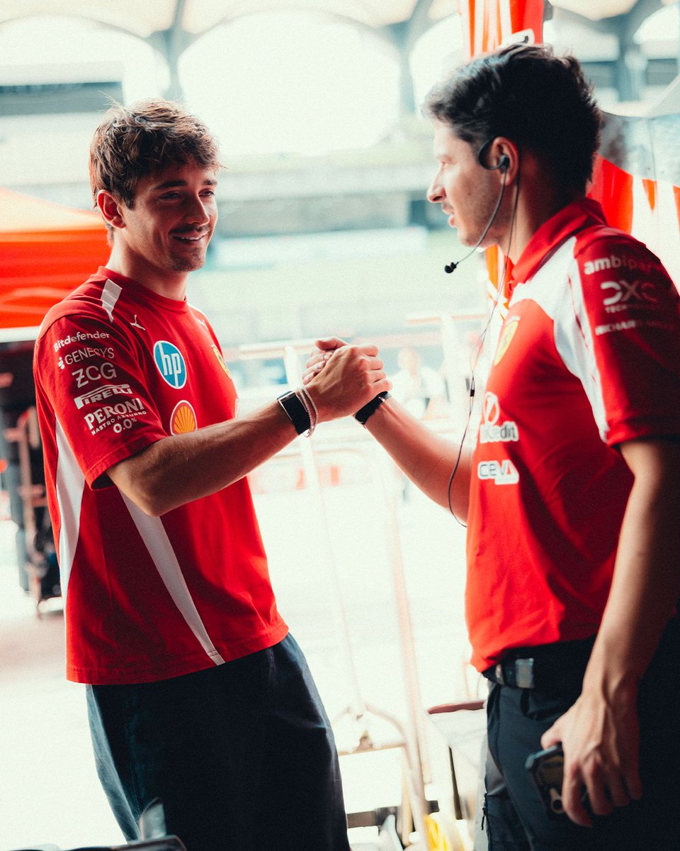 ScuderiaFerrari's tweet photo. Wouldn’t be a trip to the garage without some 🤝 from CL https://t.co/NAJzS5mj66