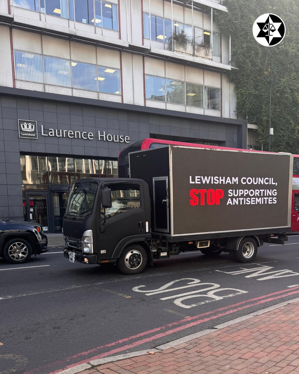 antisemitism's tweet photo. We wrote a letter to @LewishamCouncil, but didn’t receive a response, so we thought we would bring our message directly to its doorstep.

In HARTslane Gallery – a gallery operating from a building owned by Lewisham Council – Matthew Collings has unveiled his latest “art” exhibition.

Among his previous works were:

• A depiction of the French–Israeli owner of Sotherby’s auction house, with blood dripping from his mouth alongside the words “Hey look I’m selling a fantastic painting, while eating a baby alive”. The blood libel – in which Jews are accused of murdering infants in order to use their blood for ritualistic purposes – is a classic antisemitic trope which has been continually reworked into modern manifestations.
• Several paintings referred to the 7th October Hamas massacre, one apparently bearing the words: “no evidence that sexual violence was used as a weapon on October 7,” and “no beheaded babies, no evidence of rapes”.
• Pieces depicting the British Prime Minister as slavishly following orders from the Jews or the Jewish state – yet another classic trope.
• Paintings juxtaposing stars of David – the best-known symbol of Judaism and the emblem of the state of Israel – with Nazi imagery.

HARTslane Gallery has publicly rejected the International (IHRA) Definition of Antisemitism, characterising its “enforcement” in the art sector as a symptom of “increasing state repression on free speech”. This stands in direct contravention of Lewisham Council’s adoption of the Definition in 2019.

@LewishamCouncil, this new exhibition is taking place in one of your buildings. Take action now.