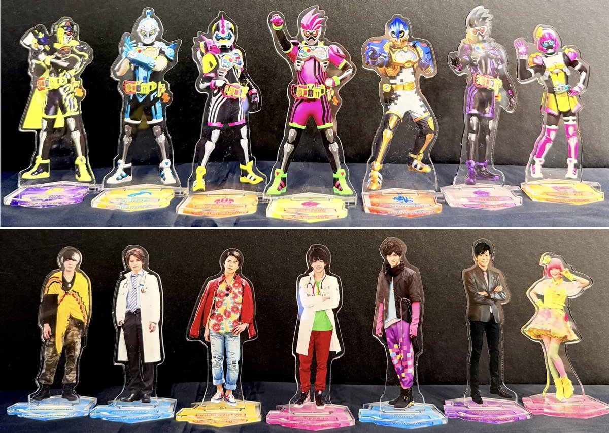 KamenRiderStore's tweet photo. 【#仮面ライダーストア東京店 新商品情報】

明日10/2(金)は #仮面ライダーエグゼイド 第1話放送から10周年‼️🎮
仮面ライダーストアではエグゼイド10周年記念アイテムが登場します🍰🔫
ツインアクリルスタンドなどキャストデザインのアイテムが多数ラインナップ🏍️🧟
更に可愛いミニキャラデザインのアイテムも豊富にご用意しております！🎵🧩
是非放送10周年をストアでお祝いしましょう🎉✨

※新商品は購入制限を設けております、予めご了承ください。
※10/2(金)はオープン前の待機場所を変更いたします。また状況に応じて整理券を配布する場合もございます。詳細は引用元ポストをご確認ください。