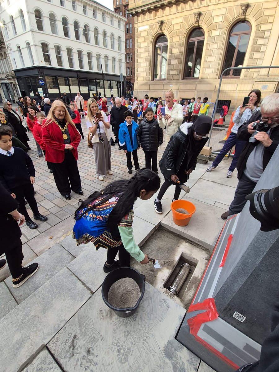 LordProvostGCC's tweet photo. Honoured to join pupils and community members as a time capsule was buried beneath the plinth of Glasgow's new Nelson Mandela monument.

Filled with reflections from young people, it will help carry Mandela's legacy of equality, human rights and anti-racism to future generations. https://t.co/z0RnUD1PbS