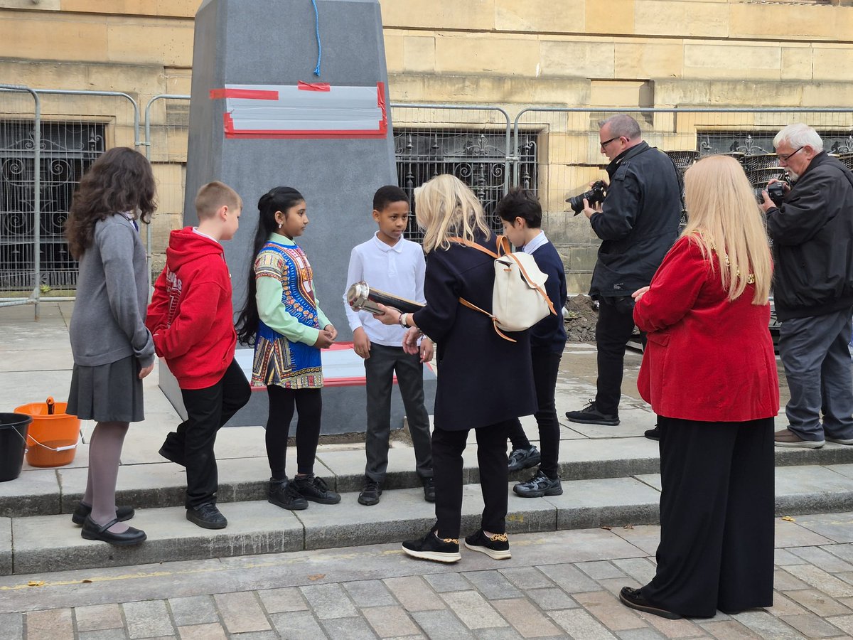 LordProvostGCC's tweet photo. Honoured to join pupils and community members as a time capsule was buried beneath the plinth of Glasgow's new Nelson Mandela monument.

Filled with reflections from young people, it will help carry Mandela's legacy of equality, human rights and anti-racism to future generations. https://t.co/z0RnUD1PbS