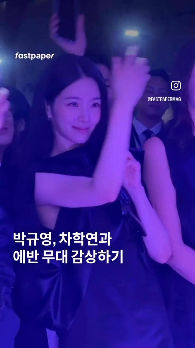 A Korean woman in a black dress poses at what appears to be a nightclub event, with text translating to attending the Bvlgari 'Ethernal' event with Park Gyu-young and Cha Hak-yeon, branded by fastpaper @FASTPAPERMAG.