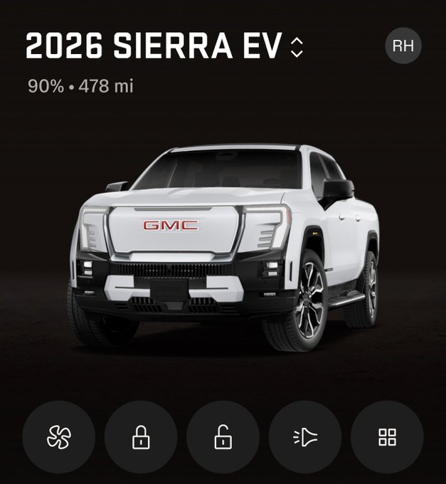 The image is a mobile app interface displaying a white 2026 GMC Sierra EV with a 90% battery charge and 478 miles of range, shown against a dark background with vehicle control icons below.

The image complements the post by showcasing the poster's new Sierra EV, the very vehicle that reportedly sparked heated debates and strained friendships after they traded in their Cybertruck.