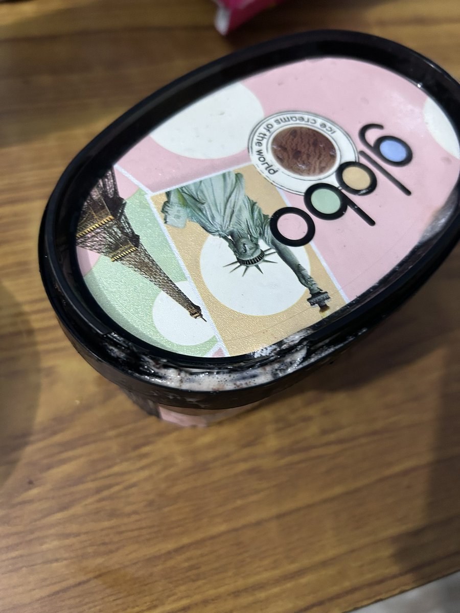 sourish200's tweet photo. @Swiggy this is extremely disappointing. My ice cream arrived with the container badly damaged and the contents spilling out, making it unsafe to consume.

It was handed to me upside down, with the damaged area apparently covered by the cutlery pouch. (1/2) https://t.co/clC28Yt7l3