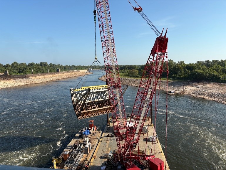 VicksburgUSACE's tweet photo. Crews used a massive crane to remove Tainter Gate #3 at Boggs Lock &amp; Dam on the Red River. Meanwhile, inspectors completed the initial HSS inspection of Gate #4, replaced earlier this summer. Together, this work supports safer, more resilient navigation. #USACE #VicksburgDistrict https://t.co/kcjCheE3R0