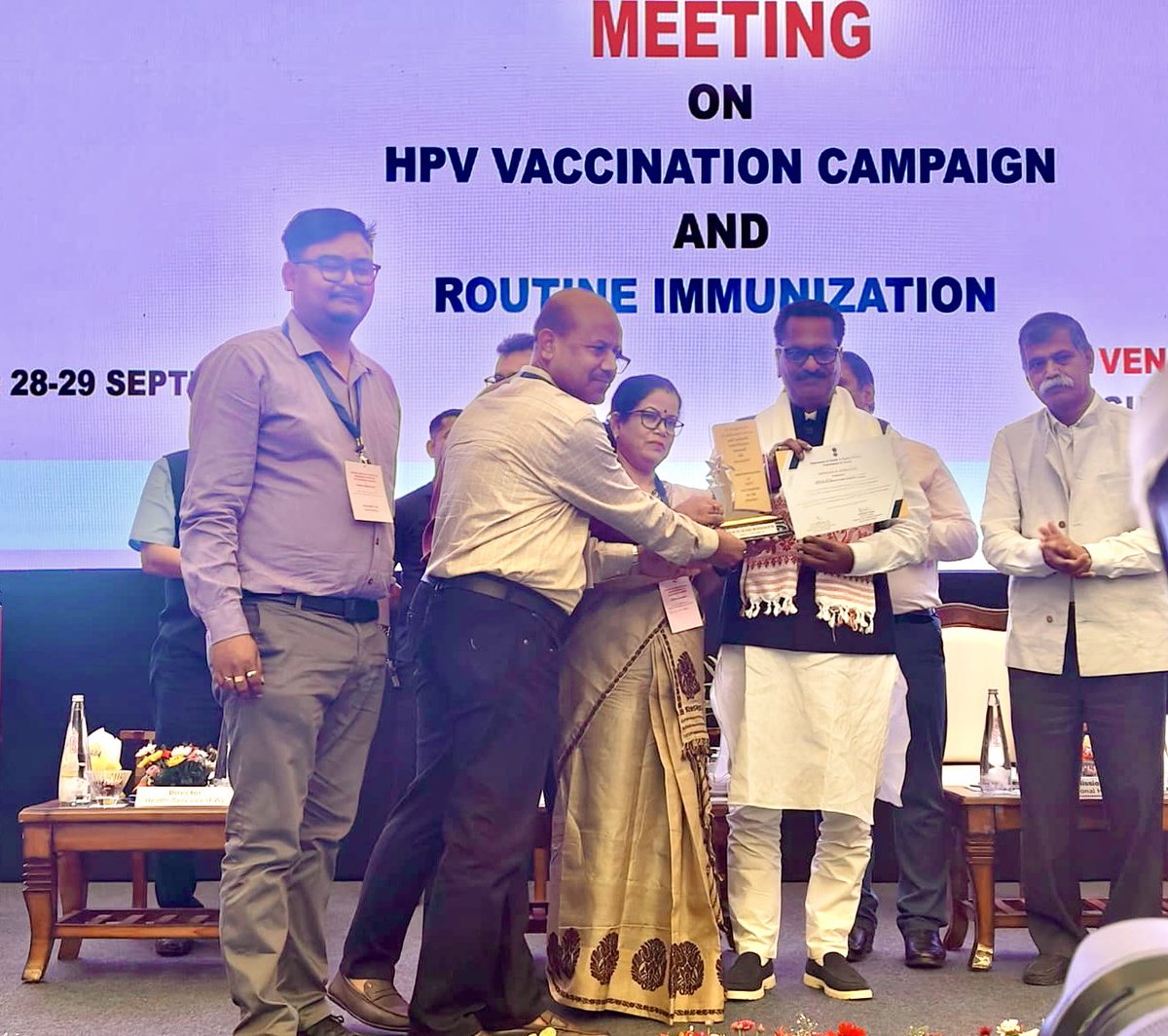 MetroNhm's tweet photo. Kamrup(M) has become the #FirstDistrict in Assam to achieve 100% of its HPV Vaccination target. 

In recognition of this outstanding achievement, the Kamrup Metro health team was felicitated with an award by the Hon’ble Minister,Health &amp; FW, Assam. https://t.co/muoJguGY4s