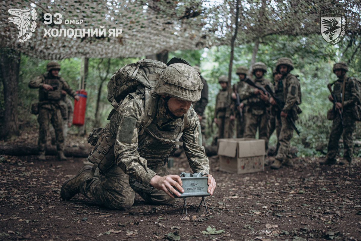 93OMBr1's tweet photo. The soldiers here come from very different backgrounds, but they have one thing in common: the decision to join the military and start over. In the photos are soldiers of the @93Alcatraz specialized infantry battalion, made up of former inmates. Some came here looking for "something to do", while others returned to Donetsk region to defend their own homes. Ahead of the Day of Defenders and Defendresses of Ukraine, we spoke with the soldiers about their experiences and motivations.

In the first photo is "Feniks" the company’s chief sergeant. He joined Alcatraz when the battalion was just being built from scratch. He says he wanted to try something new and work with people who had no previous military experience. Feniks himself has been in the military since 2018.

«It was interesting to find out what kind of people they were, how to work with them, and what to expect from them. And the results speak for themselves. Many see their service here as a chance to change their lives: rebuild connections with their families, gain new knowledge, develop themselves, and eventually, if they have the desire and ability, take on more responsibility and move into leadership positions. But everyone starts with combat».

Today, the chief sergeant says, Alcatraz has not only infantry and assault troops, but is also actively developing its drone component. The soldiers are eager to learn new things, while some already have experience from previous service.

«I spent two months in the infantry, then I became a guide. I was doing that for a long time until I ran into a sabotage and reconnaissance group» – says a soldier with the call sign "Psikh". He joined Alcatraz two years ago after serving a prison sentence and immediately became a platoon commander.

He readily recalls his encounter with a russian sabotage and reconnaissance group, because he now shares that experience with his subordinates and teaches them how to withstand such situations based on what he himself went through:

«I got the guys into position and was heading back. There were five m***erf**kers. They were heading toward Dolha Balka – they had gotten more than five kilometers into our rear. There was a dense tree line, and they were wearing our uniforms. I was heading back when the first bullet hit me in the arm, then another hit me in the side. I was lucky that I suddenly dropped – that’s what saved me»

He says he managed to hide behind a tree and get his first-aid kit. While treating himself, he overheard the occupiers talking and realized they were going to check whether he was dead. He quickly understood that he would have to fight his way out. He managed to shoot three russians, while the other two escaped.

He is convinced that only good training and preparation saved his life.

"Psikh" says he does take a soldier’s previous experience into account – both life experience and military experience. But he adds that he only begins to trust a soldier after combat missions, once everyone has had a chance to show what they are capable of.

«For example, I trust "Zhuk", the platoon commander, because he’s been through a lot too».

"Zhuk" has also been in the battalion for almost two years, just like his comrade. During that time, he has taken part in numerous combat missions, both as part of the battalion itself and alongside attached brigade units. He says he feels he has found his place in Alcatraz.

«People are different, and anyone can have a criminal record. What matters here is what kind of person you are. There’s no such thing as "status" or anything like that. We all fight here, we’re all in this together, and we all stick together. First and foremost, we have to give a person knowledge and experience. Whether they choose to learn and put it into practice is up to them. What matters here is what kind of person you are».