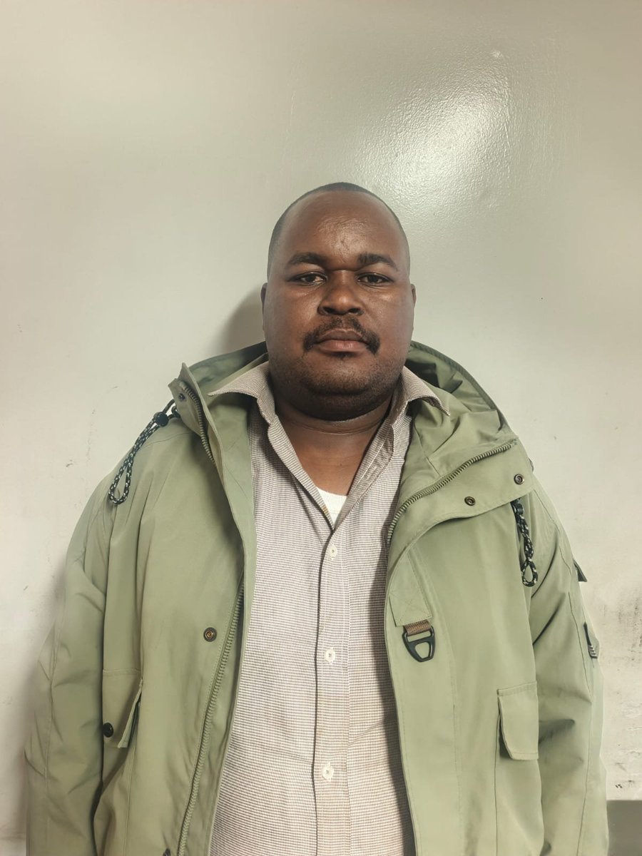 DCI_Kenya's tweet photo. 14 HELD AS DCI BUST SUSPECTED COUNTERFEIT CURRENCY OPERATION IN NAIROBI

DCI detectives based at the Jomo Kenyatta International Airport (JKIA) have arrested 14 suspects, among them three serving police officers and several foreign nationals, following a raid on a warehouse in the Vision Plaza Industrial Area, Nairobi, where suspected counterfeit US currency, fake gold bars and materials believed to be used in the production of counterfeit currency were recovered.

The operation, mounted on October 1, 2026, followed a complaint by a US national, Alkhalifi Ibrahim Hassan, and recorded at the JKIA Police Station.

The suspects, comprising Kenyan and foreign nationals from Nigeria, Cameroon and Sudan, as well as three police officers attached to the Security of Government Buildings (SGB), Uhuru Camp, were arrested after DCI officers searched the warehouse located behind Vision Plaza. Two officers were armed with Beretta pistols whereas their other accomplice was armed with a Chalbi pistol. 

The suspects are, Anthony Oyieka Namani- Nigerian, Soulemanou- Cameroonian, Abbas Ibrahim Mohamed- Sudanese, George Kinyanjui, Geofrey Omondi Juma, William Kimolo, Solomon Ndeda, Raphael Wayaya, Kevin Barasa, Erick Honla, Maureen Ogany, Cpl Joseph Otenyo Okimba, APC Douglas O. Odira and APC Felix Oyawa Odhiambo

A total of 31 sealed black pallets were recovered. Further scrutiny established that three of the pallets contained 156 bundles of US$100 notes suspected to be counterfeit, while the remaining pallets contained cement.

Detectives also recovered a plastic box containing 65 pieces of gold bars suspected to be fake; a box containing assorted chemicals suspected to be intended for the manufacture of counterfeit currency; and another box containing assorted papers printed with US dollar notes.

Other exhibits recovered included a black bag containing 13 bundles of US$100 notes suspected to be counterfeit, assorted aluminium seals, seven cartons of UN blue plastic seals, two Kenya Revenue Authority reflector jackets, two empty suitcases, a green pallet-strapping roll, a padlock cutter and a hacksaw.

The scene was processed and the exhibits secured as investigations continue to establish the circumstances surrounding the suspected counterfeit currency operation and the identities and respective roles of those involved.

The suspects are currently assisting detectives with ongoing investigations, with appropriate legal action to follow upon completion of the inquiry.

#FichuaKwaDCI. Call 0800 722 203 (Toll-free) or WhatsApp at 0709 570 000 to report anonymously. Usiogope