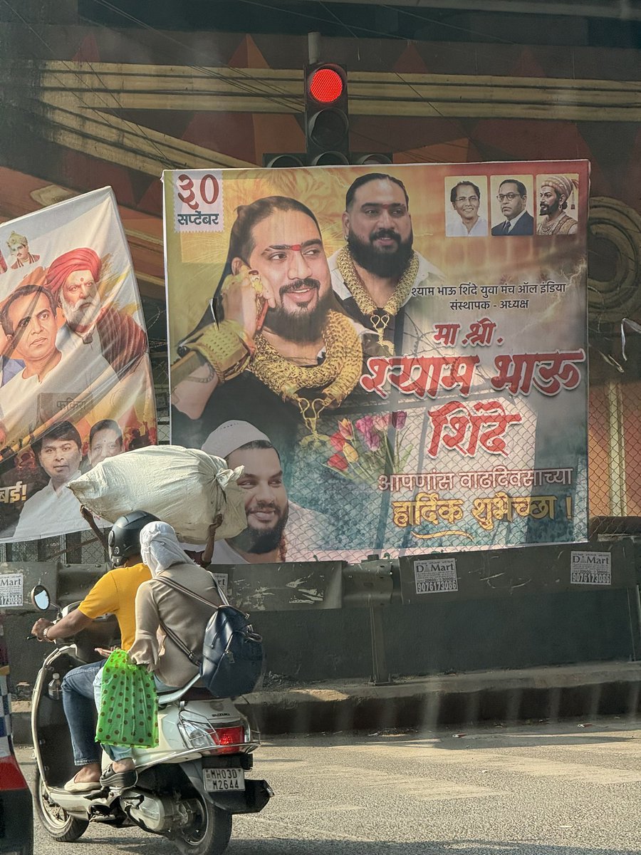 INDIANSBLOOD's tweet photo. @mybmcWardME @mybmc Why is there an illegal hoarding installed at Shivaji Nagar Signal unnecessarily occupying public space? This is causing obstruction and should not be allowed. Requesting you to inspect the location and take immediate action to remove the illegal hoarding. https://t.co/70ByM6Sack