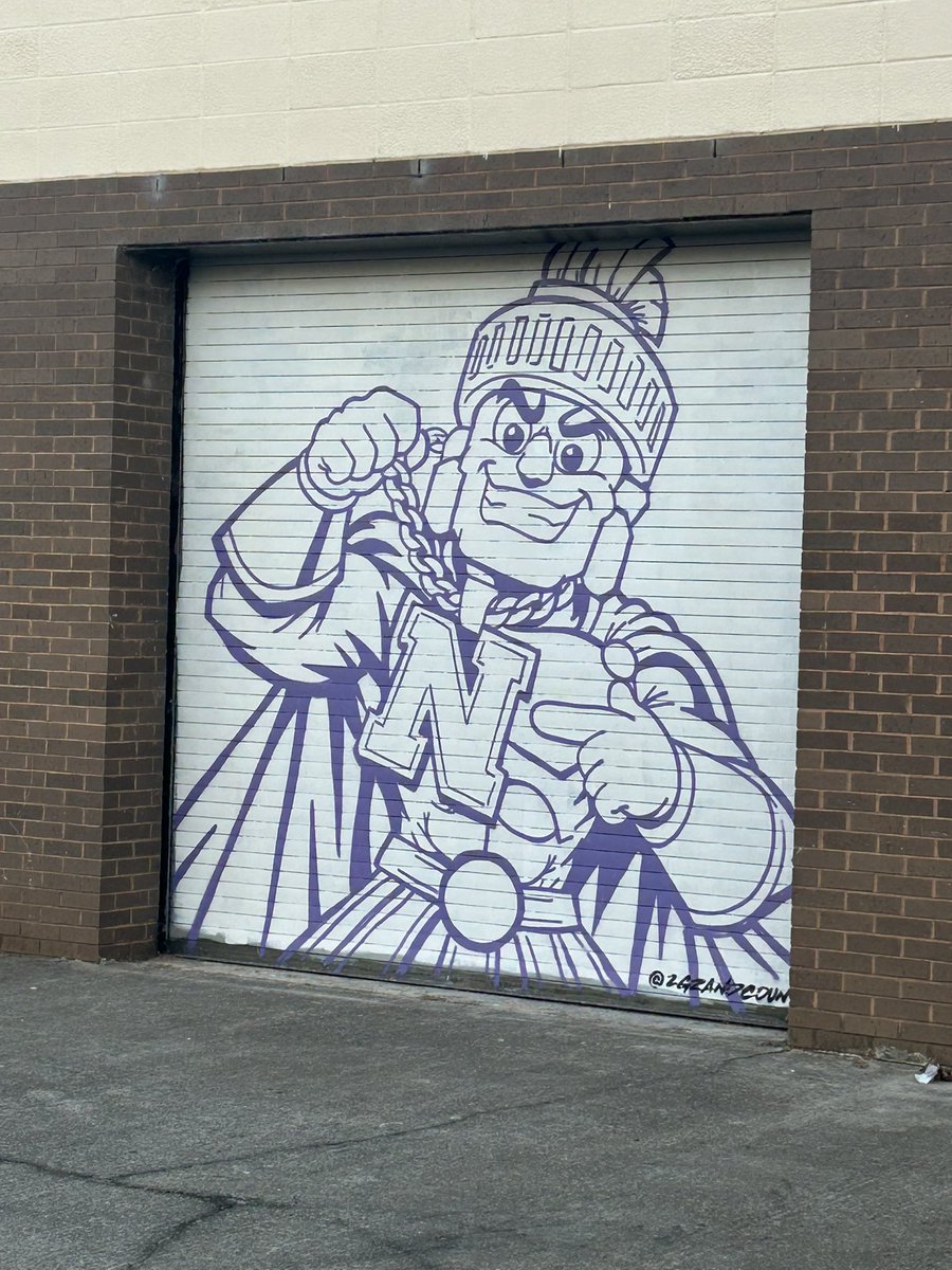 NHSTrojansFB's tweet photo. Thanks to @NHSTrojansFB Alumn @2GZandCountin for the mural!  #WinToday https://t.co/RDaf5QHUwW