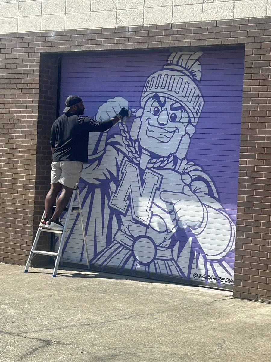 NHSTrojansFB's tweet photo. Thanks to @NHSTrojansFB Alumn @2GZandCountin for the mural!  #WinToday https://t.co/RDaf5QHUwW