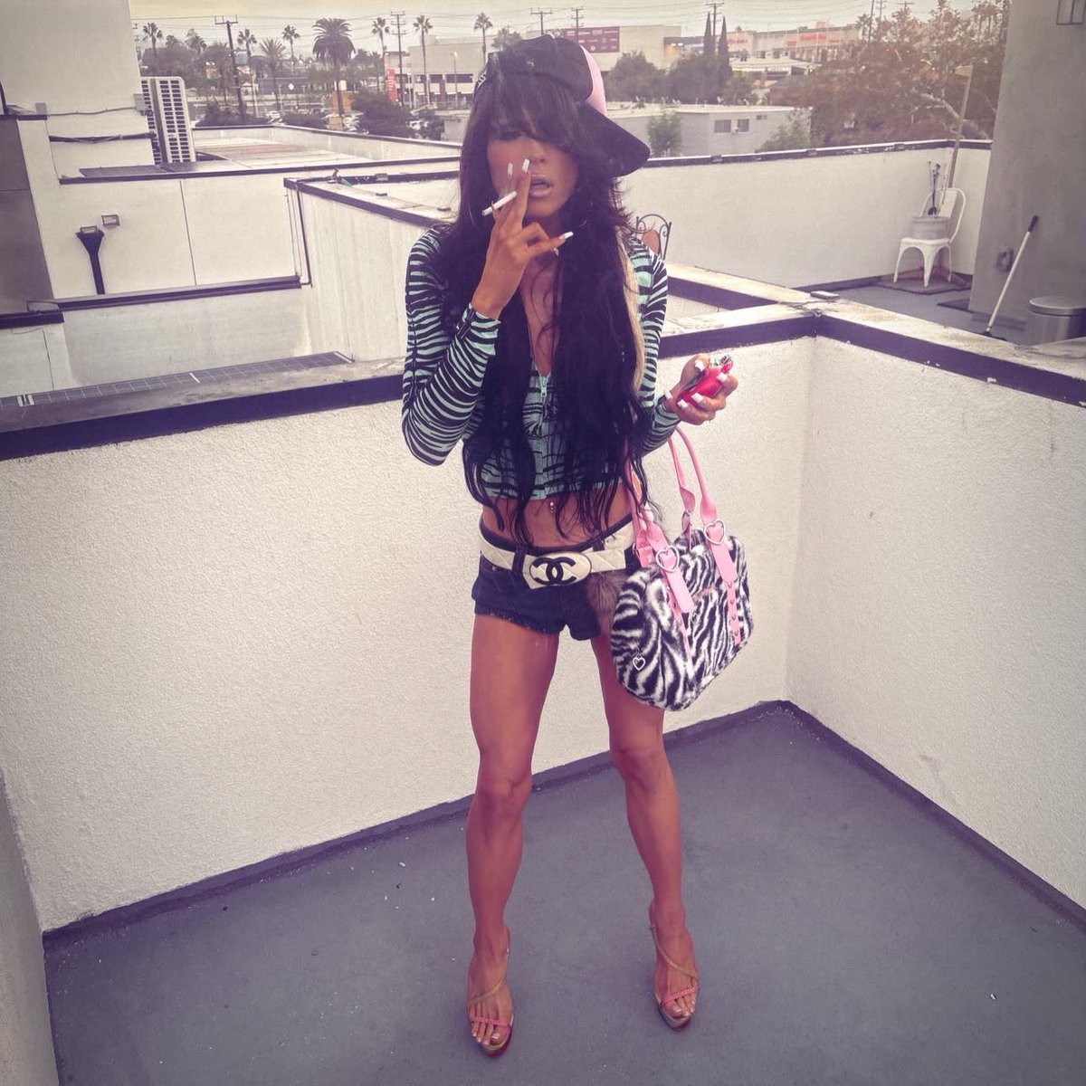 theayeshacorner's tweet photo. “My favorite bag to hold all my cigarettes and vapes and tampons!!!” - Ayesha Erotica https://t.co/1V0NXd1Nuk
