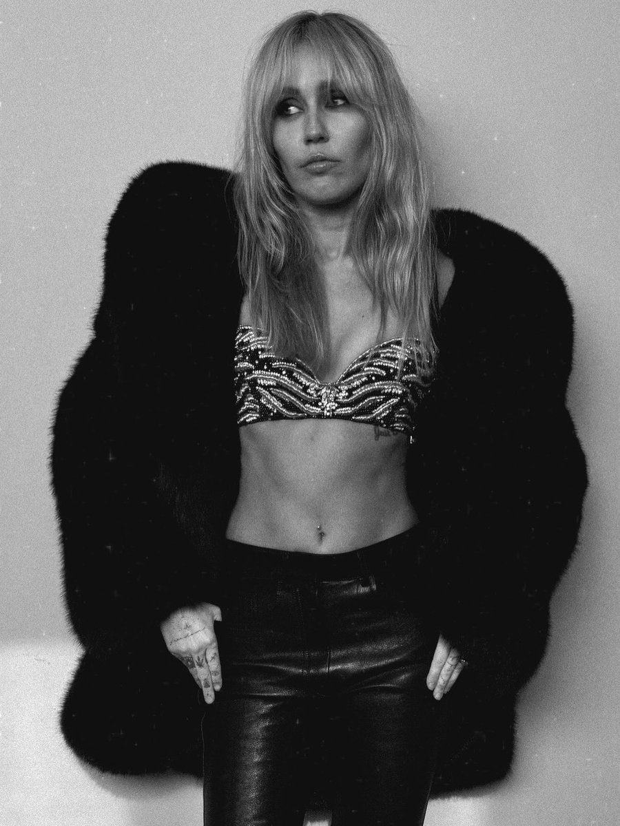 miley's tweet photo. Dropped the video for Different Religion featuring @modelactriz to celebrate BP the album being #1 this week. Love you 🖤 DR OUT NOW! https://t.co/CT9IKFWns4