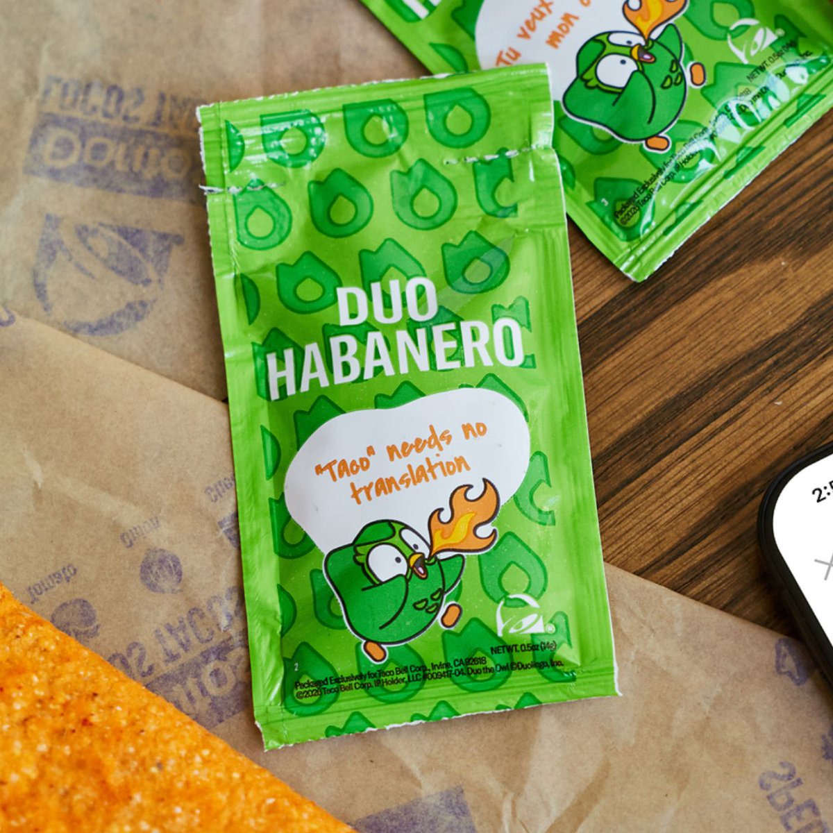 Dexerto's tweet photo. Taco Bell is giving Duolingo's mascot its own Habanero Sauce for a limited time

They're also giving away plushies of Duo dressed as a Taco Bell worker https://t.co/YBQqZriIUR