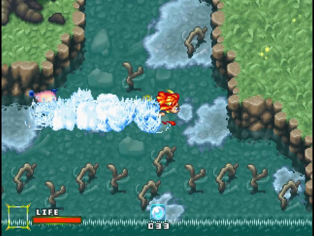 A top-down video game screenshot showing a character shooting a blue energy wave at enemies in a watery area, with a 'LIFE' bar and a score of '033' at the bottom.