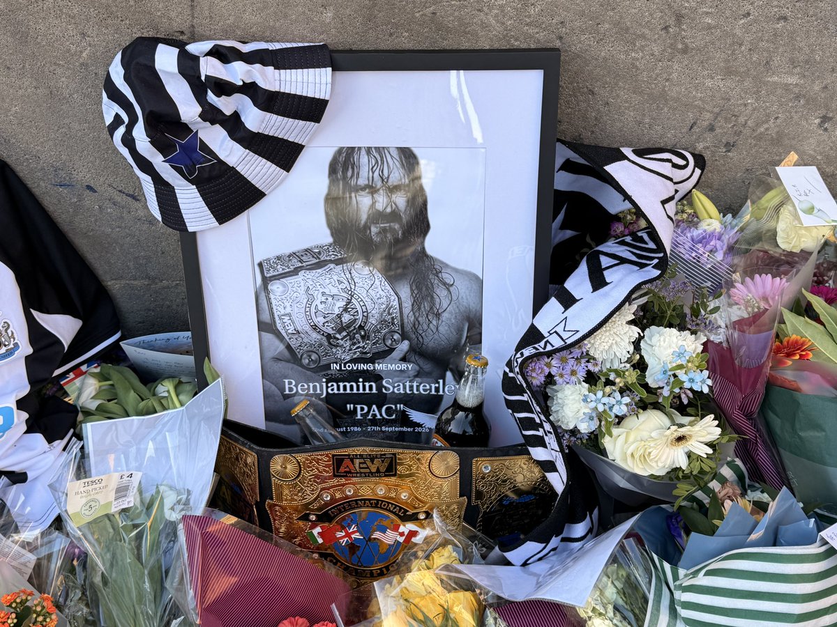 PhilJubb1's tweet photo. Very touching memorial for PAC at Grey’s monument. Proud to be a Geordie. Gravity may have forgotten him but we never will 🖤🤍 @WWE @AEW @FinnBalor https://t.co/UeN21uQXzE