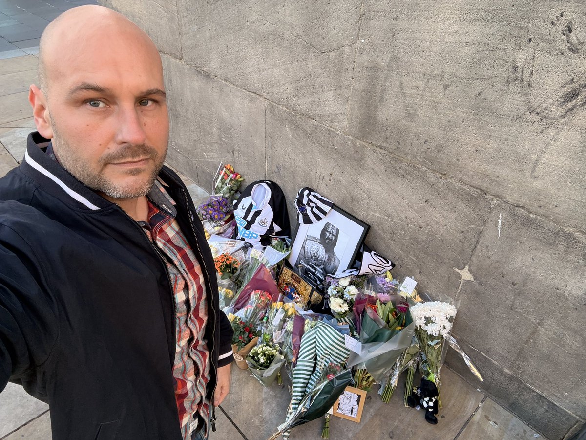 PhilJubb1's tweet photo. Very touching memorial for PAC at Grey’s monument. Proud to be a Geordie. Gravity may have forgotten him but we never will 🖤🤍 @WWE @AEW @FinnBalor https://t.co/UeN21uQXzE
