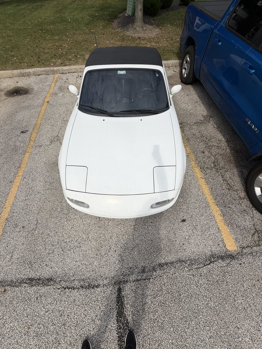 YourWaifu's tweet photo. One of the best parts of driving a tiny car in the age of SUVs is that you can park like shit and still be completely within the lines https://t.co/UjdJdb8aEx