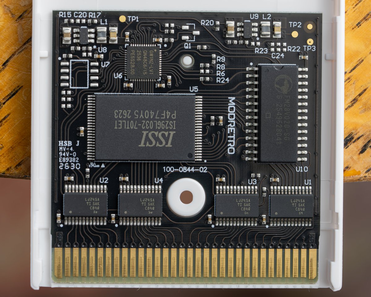 Natzke's tweet photo. The @OpenAI #DevDay @modretro Cartridge #PCB
Got out my #IFIXIT temper proof ☆ security torx and took a peek inside the "Demo Cartridge" that came with the @Nintendo #Gameboy / #Chromatic
I'm assuming I can't just reverse engineer the parts in hopes of making a copy?! Haven't found anything similar online (just Flash GB Cartridge Drives)