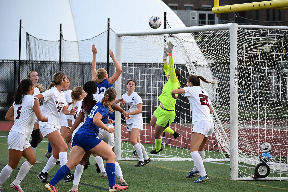 MIT's goalie blocking a shot on goal.