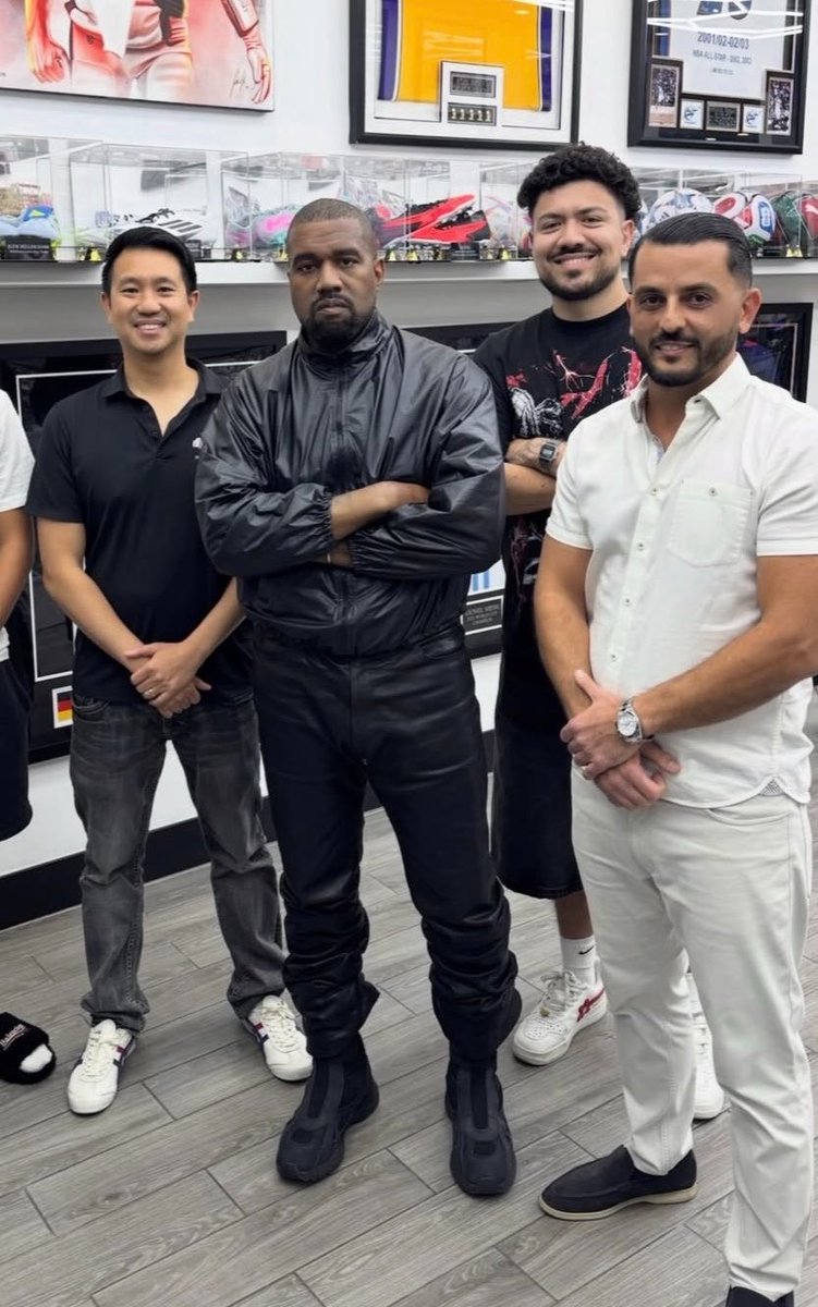 YZYFRANCE1's tweet photo. Ye spotted at LA Sports Cards in Burbank wearing what appears to be the YEEZY 800S High Tactical Boot 👀🖤 https://t.co/OCSx3OBg6K