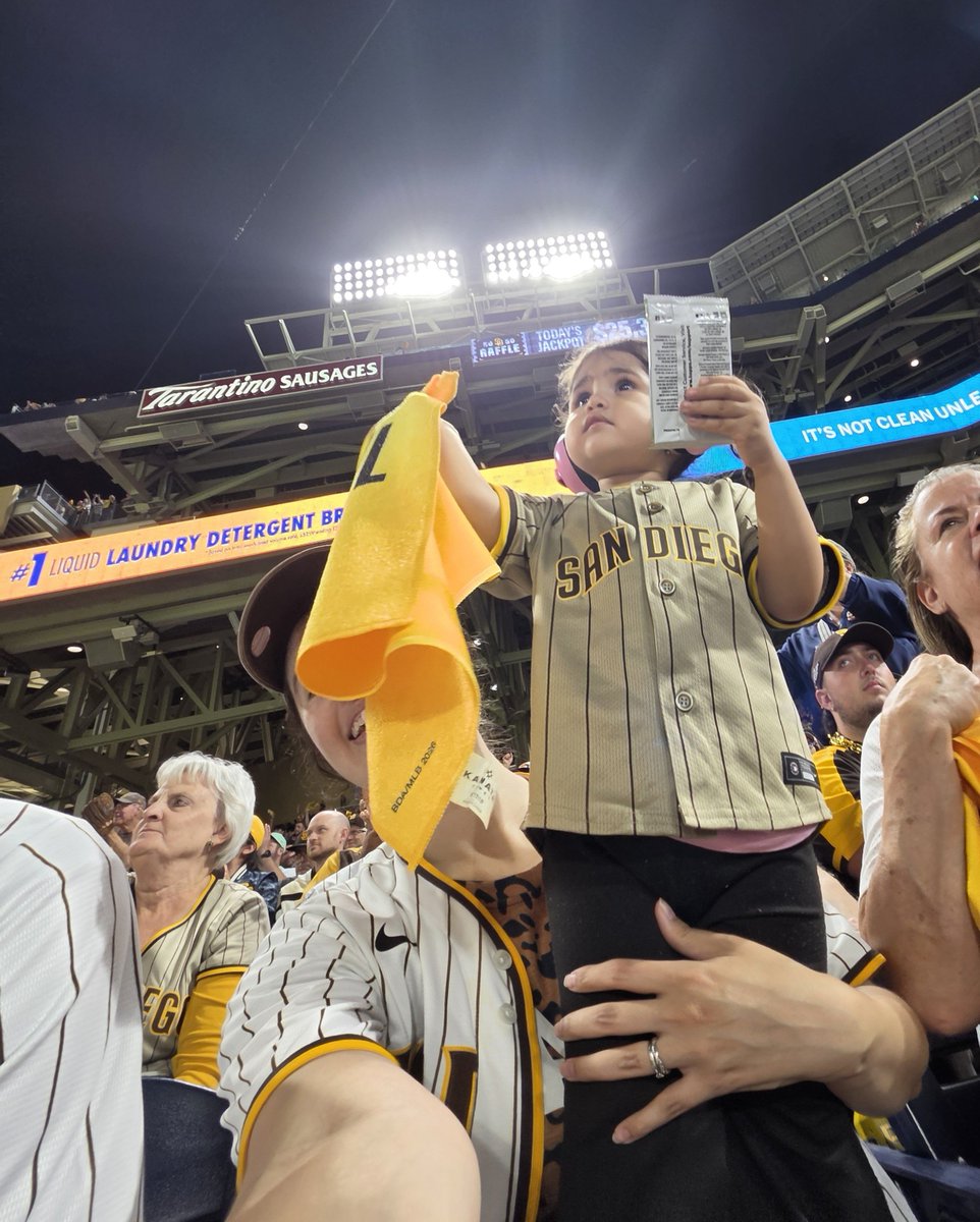 bernsrose's tweet photo. Want to give a shoutout to 2 Petco Park employees last night who gifted Dakota some special souvenirs and made her so happy: one of the 50/50 raffle guys gave her a pack of baseball cards and one of the security guards in our area brought over a game ball for her 💛 thank you!!! https://t.co/xtFuBmJUKc