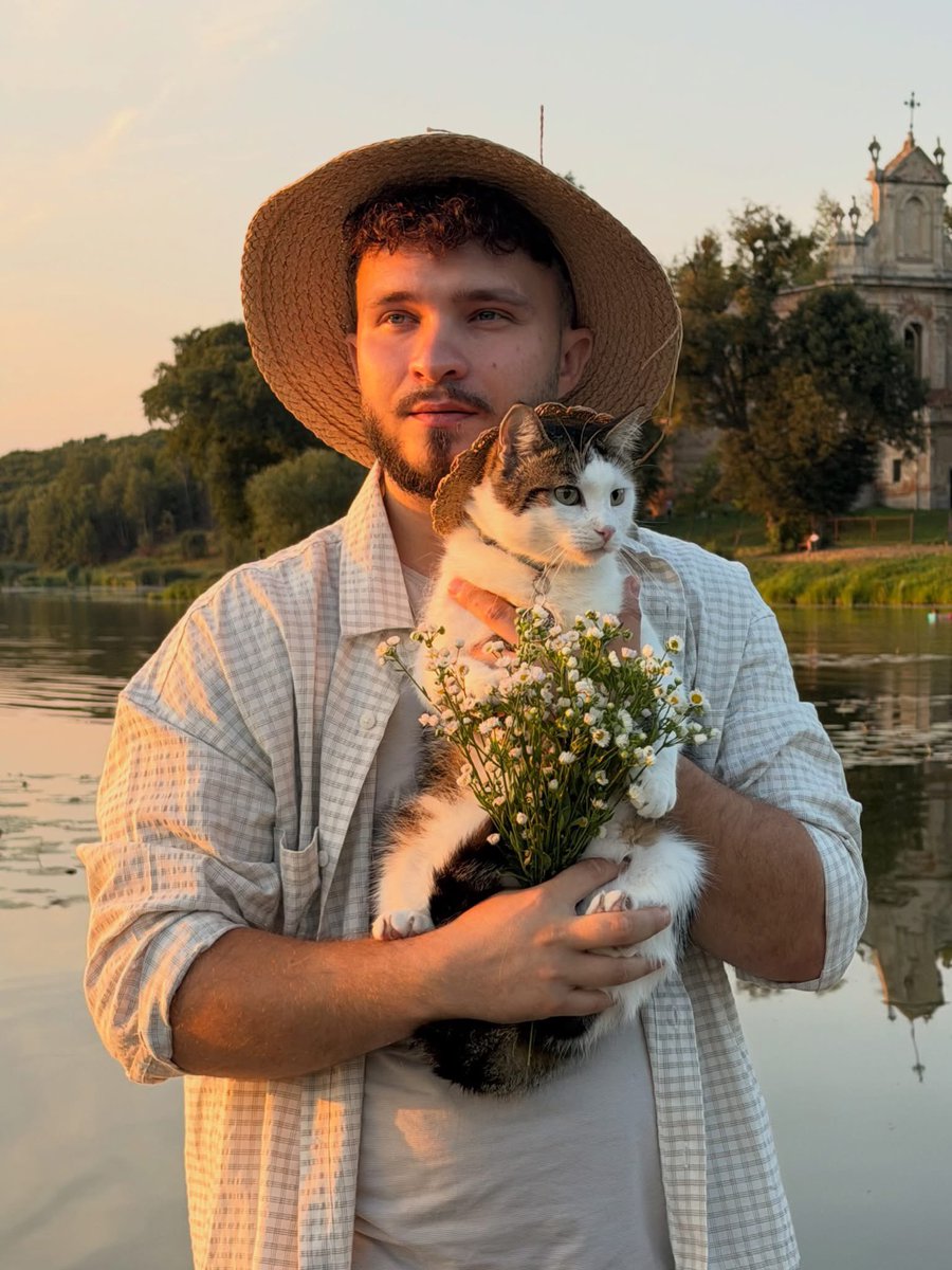 LorenzoTheCat's tweet photo. Two of our favorite Ukrainians—Alex and Shayba the cat. Still standing. https://t.co/2VP7c5oQzh