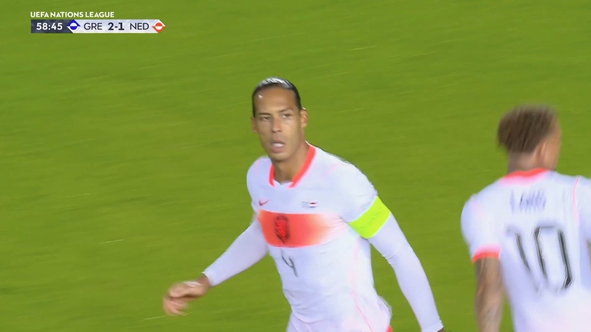 A football player wearing jersey number 4 on the field during a UEFA Nations League match between GRE and NED at 58:45.
