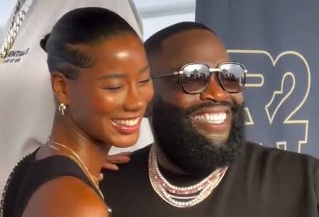 FearedBuck's tweet photo. Rick Ross’ girlfriend alleges in a police report that he slapped her after becoming enraged that she was tagged in an Instagram photo. 

She says he later accused her of being involved with someone she was only friends with, hit her in the chest several times, choked her by twisting her hoodie collar, grabbed her ponytail and slammed her into a wall, then struck her in the face, causing a busted lip. She also alleges he pushed her to the floor and tried to spray her with the showerhead.