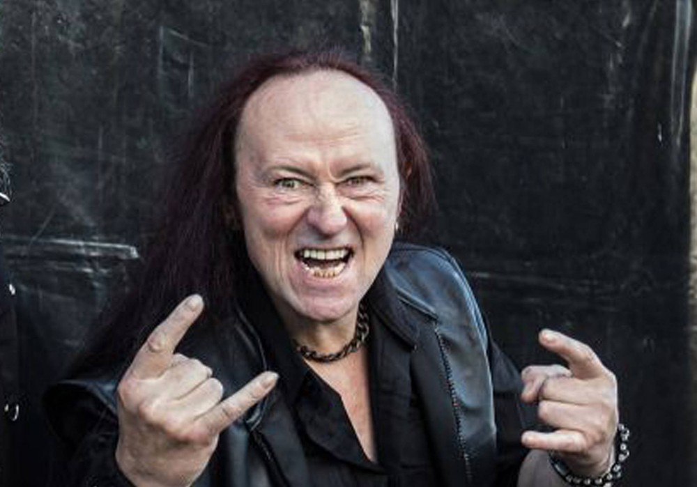 g1's tweet photo. Conrad 'Cronos' Lant, vocalista do Venom, morre aos 63 anos https://t.co/2Gq1A52yhN https://t.co/cA7WiJYyvr