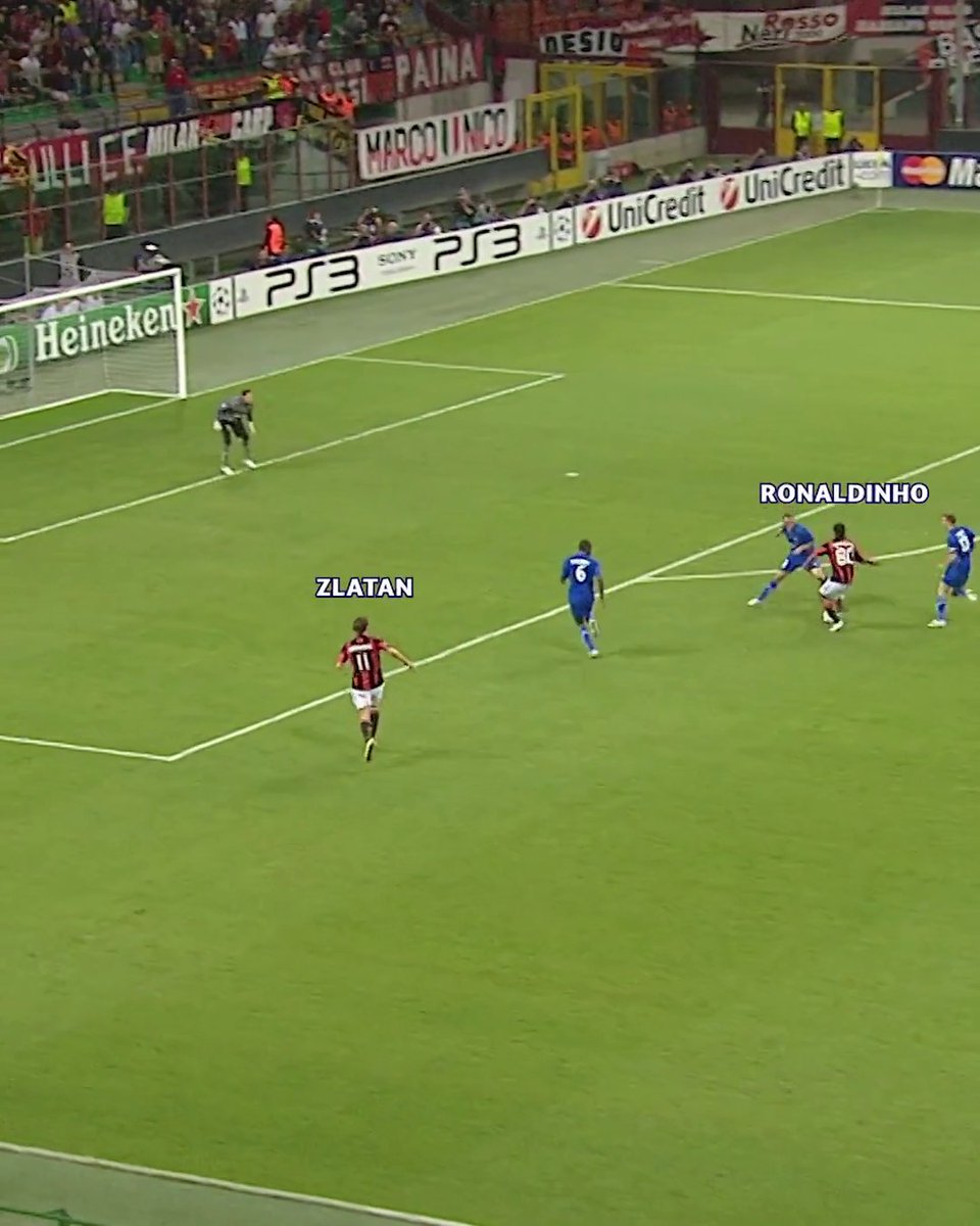 A soccer match clip from AC Milan features on-screen text labels identifying players 'ZLATAN' and 'RONALDINHO' as they advance toward the goal.